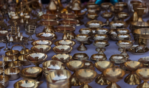 Brass designer lock products in Indian souvenir store.