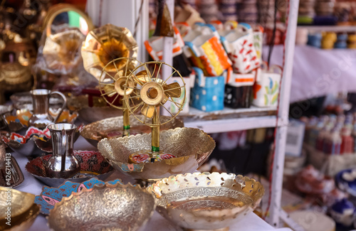 Brass designer lock products in Indian souvenir store.