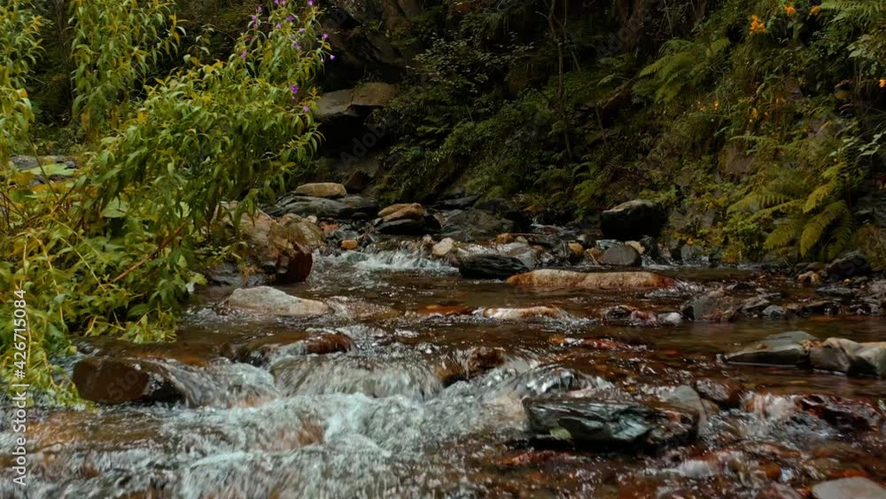 River with a lot of water flowing down bethween rocks River with a lot of water flowing down bethween rocks