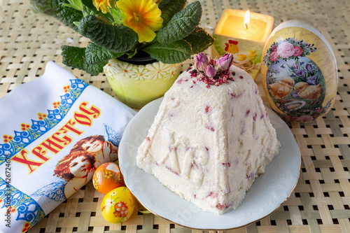 Easter table dessert with eggs and candle