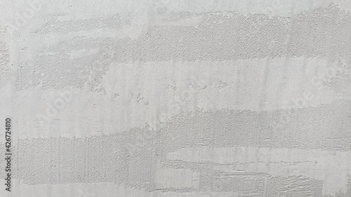 Close up of grey grunge and scratches concrete texture use as a background with space for design. whitewash concrete plaster wall for loft style concept.