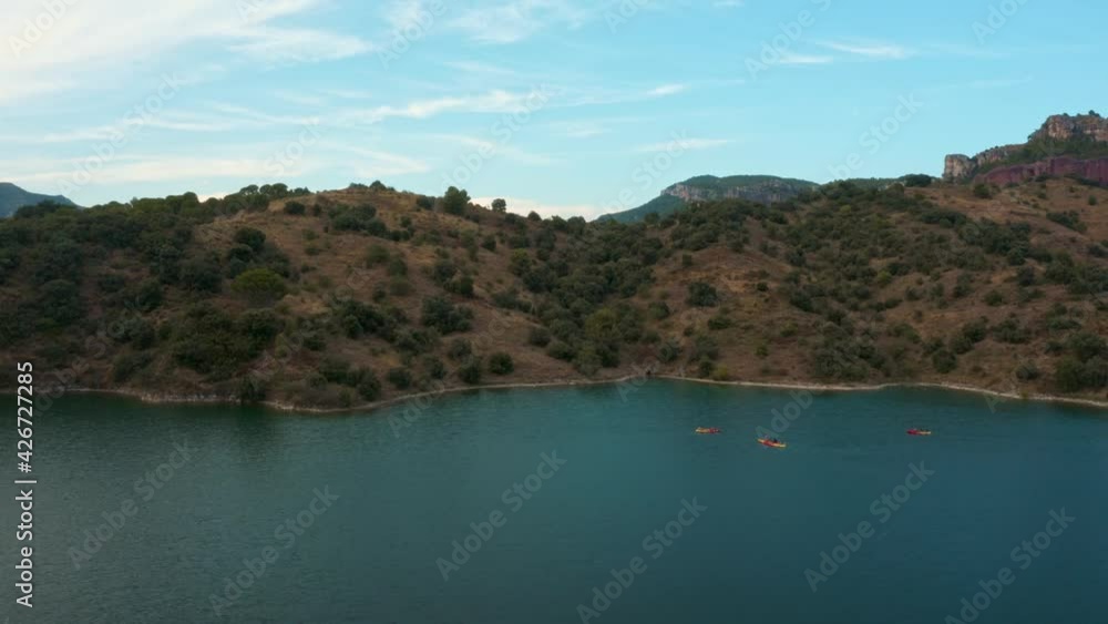 Arial Drone Shot of people doing kayak in a lake Arial Drone Shot of people doing kayak in a lake