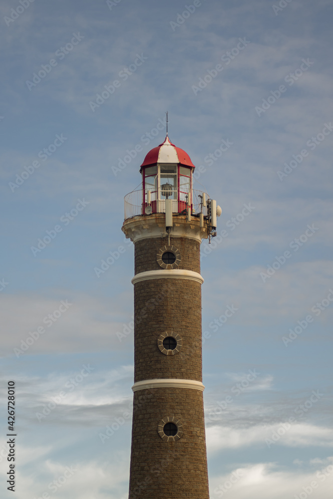 brick lighthouse with sky background
