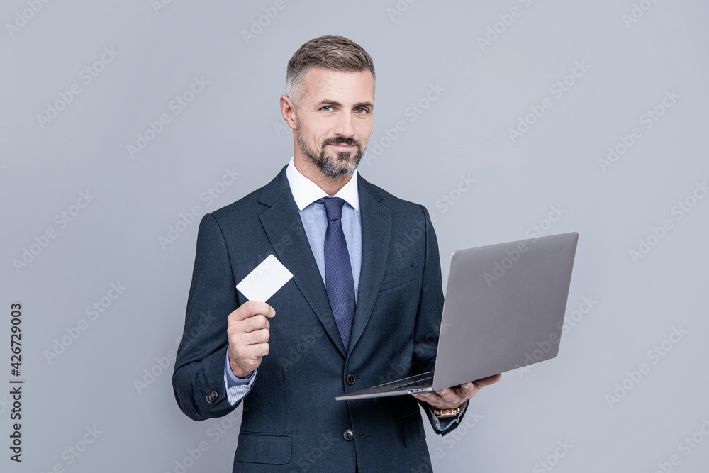 network administrator hold laptop. man pay in online banking. online money. network administrator hold laptop. man pay in online banking. online money.