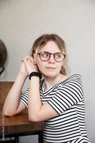 Smart high school girl with glasses