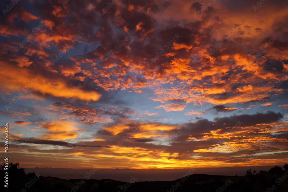 orange golden cloudscape and magical sunrise over the mediterranean sea