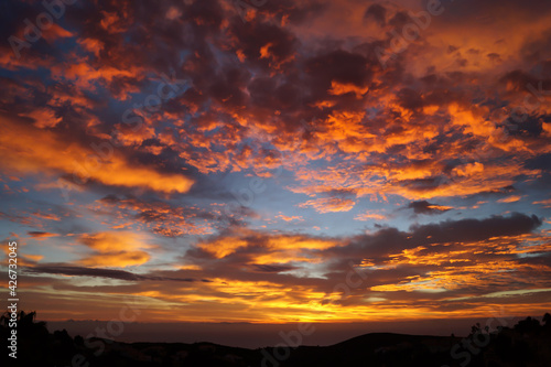 orange golden cloudscape and magical sunrise over the mediterranean sea