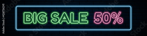 Discount sales banner with neon on dark blue brick background. Navy blue vector brick wall with neon sign. Wide horizontal banner for a big sale.