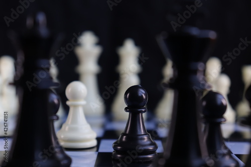 Game of chess. Chess is photographed on a chessboard. Table games. Strategy games. Creative minimal concept. Strategy, management or leadership concept. Business success concept.