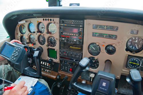 The instrument panel in the cockpit of the Cessna 182 RG Skylane in flight.