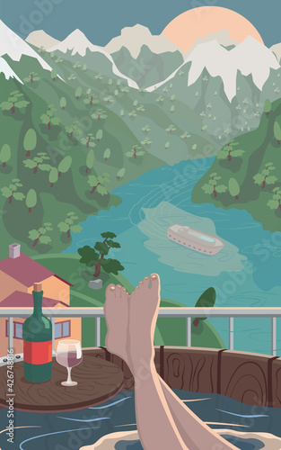 Peaceful view from balcony with woman legs in bath, bottle and glass of wine on the table, green mountains, sunset, cruise ship and blue river somewhere in Scandinavia