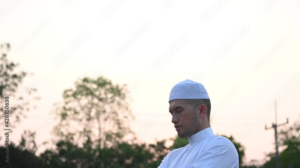 Asian white islam man prayer,Young Muslim praying,Ramadan festival concept Asian white islam man prayer,Young Muslim praying,Ramadan festival concept
