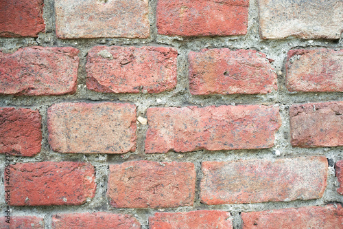Old vintage red weathered brick wall, background, pattern, texture, banner