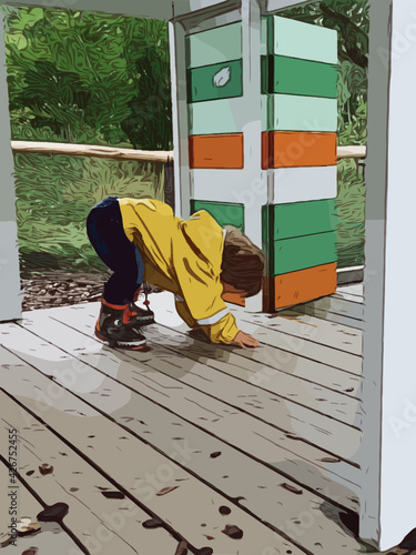 Boy bending down