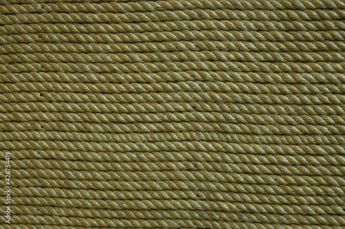 Background and texture  cube wrapped in rope.