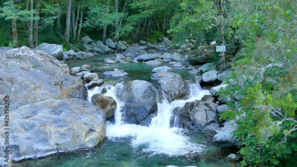 River with big stones and a beautiful landscape on Corsica island, France 4K River with big stones and a beautiful landscape on Corsica island, France 4K