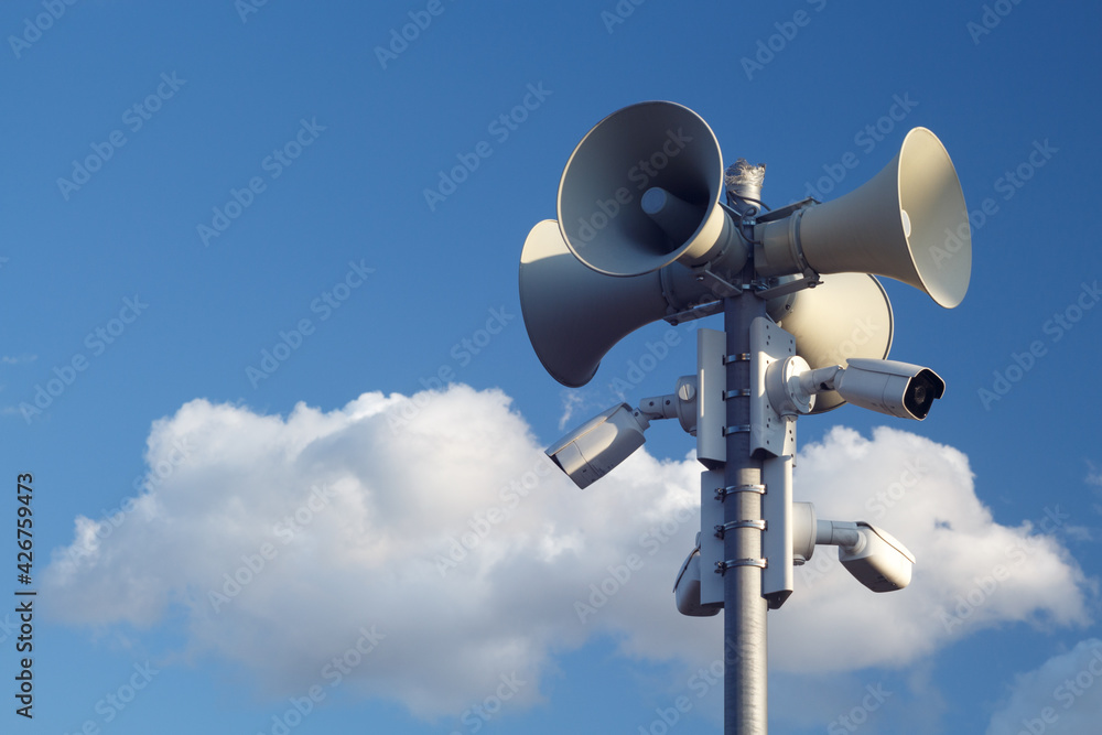 Security system with video surveillance and megaphones in the open air. Copy space. Security system with video surveillance and megaphones in the open air. Copy space.