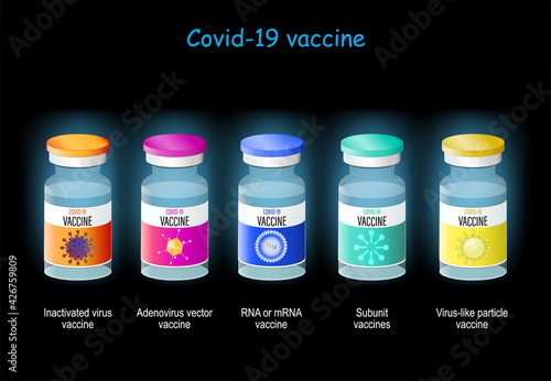 vials of vaccine against virus SARS‑CoV‑2 on dark background