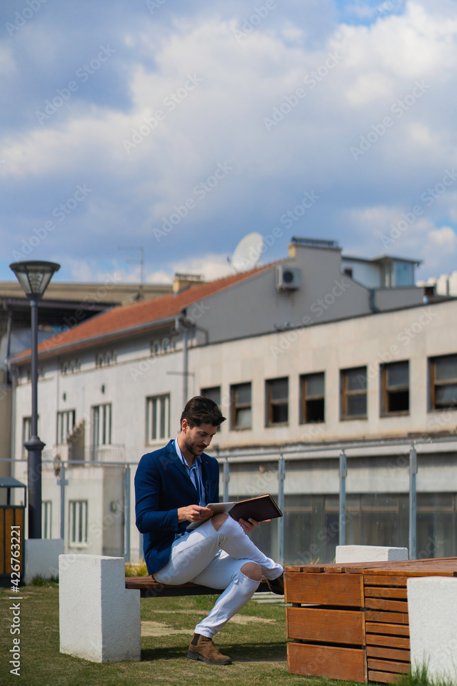 Fototapeta premium Sitting and working outdoor