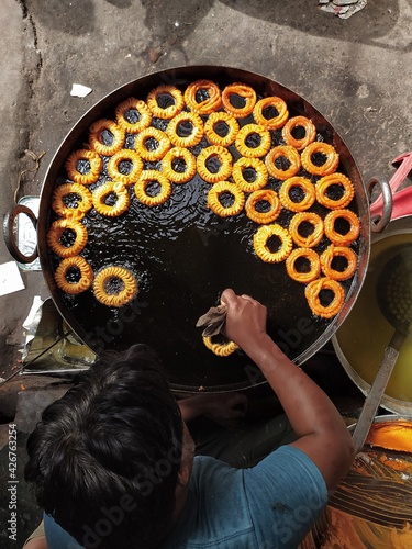 Imarti or Amriti is a sweet from India. It is made by deep-frying vigna mungo flour batter in a circular flower shape, then soaking in sugar syrup.