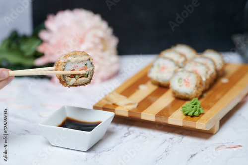 Sushi Rolls on the board beautiful view
 photo