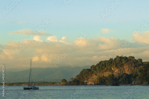 Boat on the see in Costa Rica with mountain