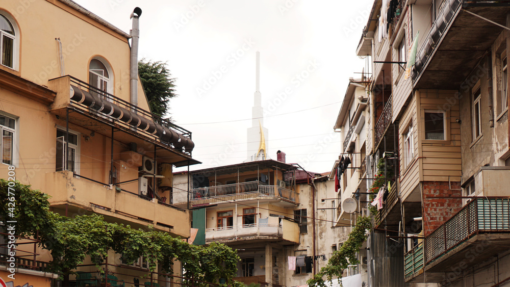 Old multi-storey buildings in Georgia. Traditional houses of Batumi, old street.