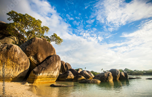 Beautiful seascape with big rock formation of Tanjung Tinggi Beach in Belitung, Indonesia.