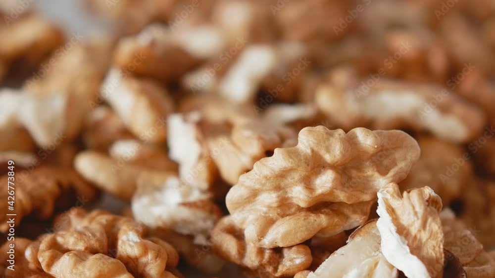 Peeled Walnuts, Nuts. Healthy Food. Peeled fresh walnut on a white plate. Peeled Walnuts, Nuts. Healthy Food. Peeled fresh walnut on a white plate.
