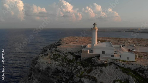 Aerial shot Lampedusa Island (Drone 4k), seagulls, isola dei conigli at sunset - concept of paradise on earth, happiness and travel to beautiful places