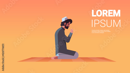 religious muslim man kneeling and praying on carpet ramadan kareem holy month religion concept flat full length horizontal copy space