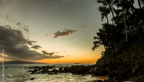 Sunset  at Paako Cove aka Secret Beach With Kaho'olawe Island in the Distance, Maui, Hawaii, USA photo