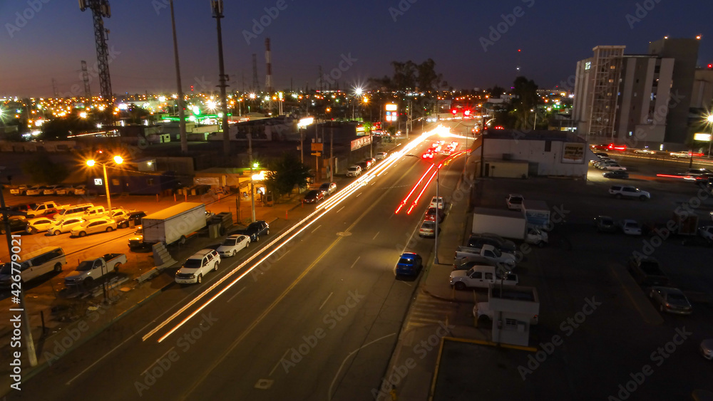 Cars on the city street, long exposure, car lights, painting with light. Autos en la calle de la ciudad, larga exposición, luces de carros, pintando con luz. Cars on the city street, long exposure, car lights, painting with light. Autos en la calle de la ciudad, larga exposición, luces de carros, pintando con luz.
