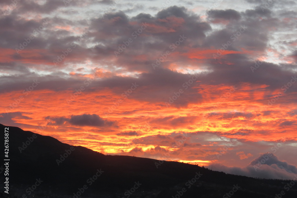 Obraz premium Sunset in the north of Quito, Ecuador behind the Pichincha's volcano