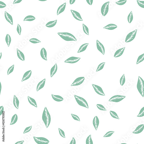 Vector seamless pattern with green hand drawn simple leaves on white background