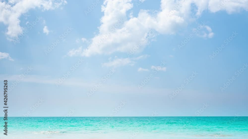 Aerial view paradise of topical sea and beach, timelapse footage of blue sky and clouds fast moving over the blue clear ocean, clear air at seacoast scenery. summer hot weather and season. Aerial view paradise of topical sea and beach, timelapse footage of blue sky and clouds fast moving over the blue clear ocean, clear air at seacoast scenery. summer hot weather and season.