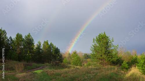 Rainbow over the forest-steppe. Samara region, Russia.