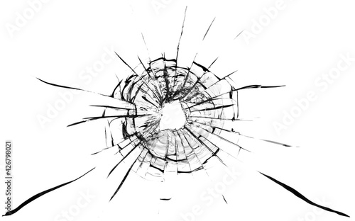 Bullet hole in the glass. Isolated on a white background.