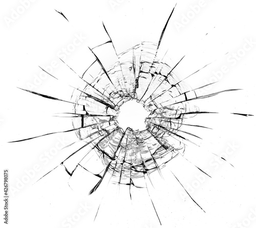 Bullet hole in the glass. Isolated on a white background.