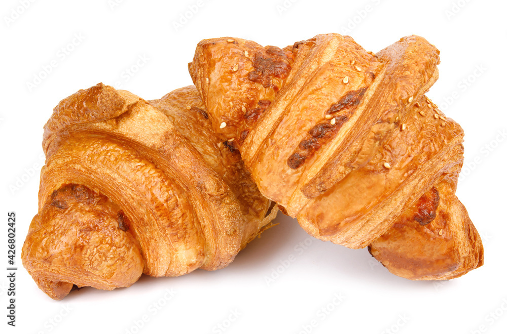 Two croissants isolated on a white background. Two croissants isolated on a white background.