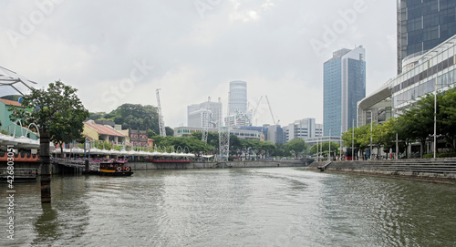 View of the embankment North Boat Quay. People do their own thing