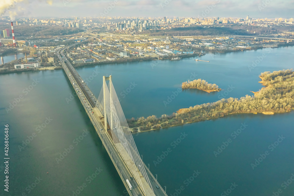 Aerial view from drone on South Bridge in Kiev, city skyline and landscape of Dnipro river, Ukraine