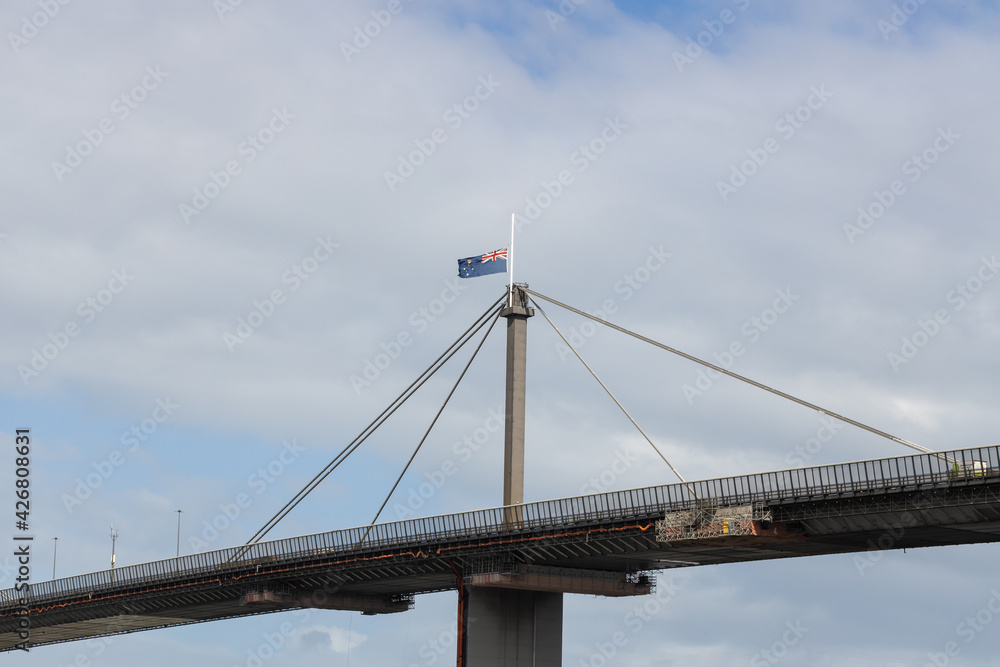 Obraz premium Westgate Bridge in Melbourne Australia with flag at half mast due to the death of Prince Philip, Duke of Edinburgh.