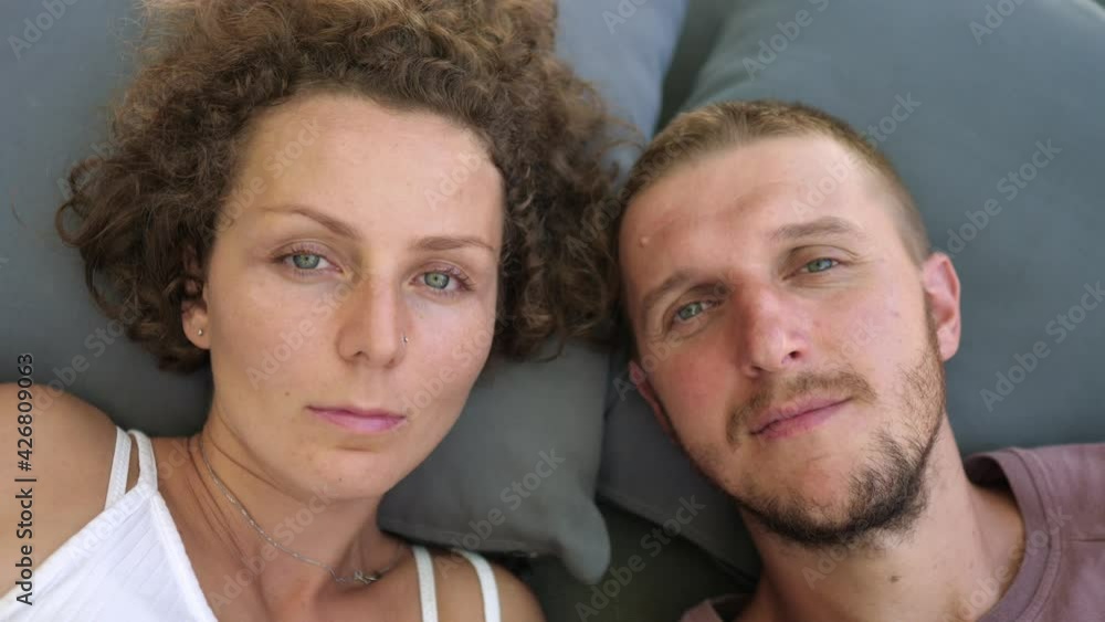 Portrait of young caucasian couple staring to the camera. Portrait of young caucasian couple staring to the camera.