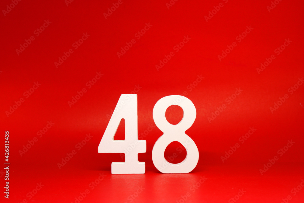 Forty Eight ( 48 ) white number wooden Isolated Red Background with Copy Space - New promotion 48% Percentage Business finance Concept Forty Eight ( 48 ) white number wooden Isolated Red Background with Copy Space - New promotion 48% Percentage Business finance Concept