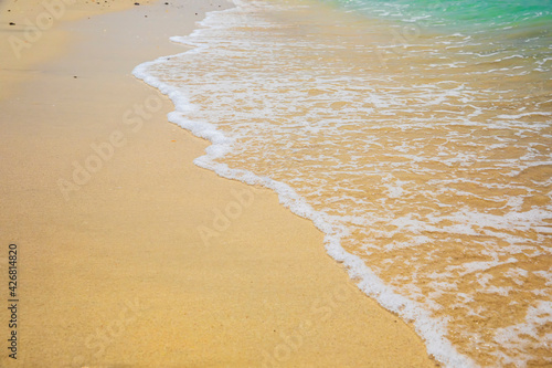 Rolling turquoise waves ash...
