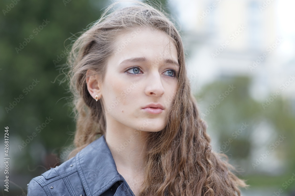 Portrait of a young beautiful girl in the park Portrait of a young beautiful girl in the park