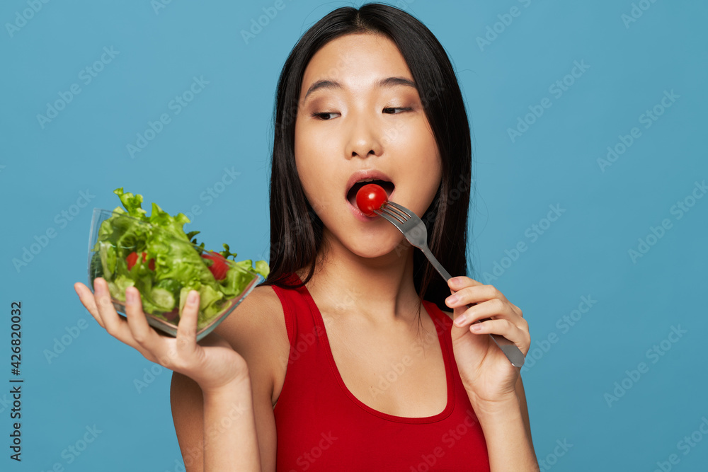 woman with novelty tomato and salad in plate calories diet model woman with novelty tomato and salad in plate calories diet model