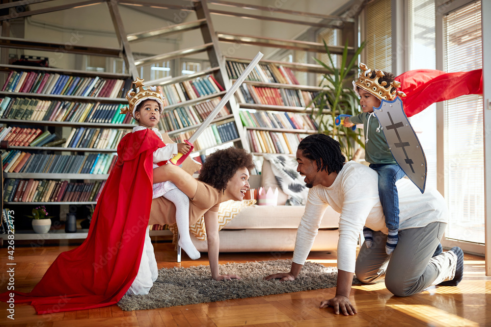 Happy afro american family playing