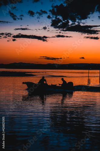fishermen with sunset